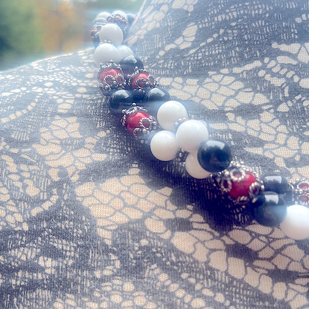 Three Stranded Statement Necklace made of red, black, white, and silver bead.
